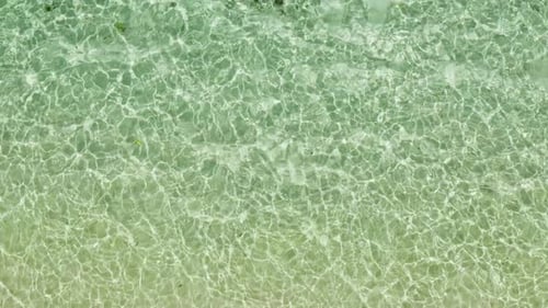 Tropical Beach and Blue Sea with Waves.