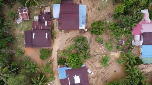 Aerial top down view tractor use to clear the mud