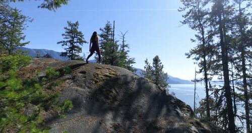 Woman Performing Yoga on Rocky Mountain 4k
