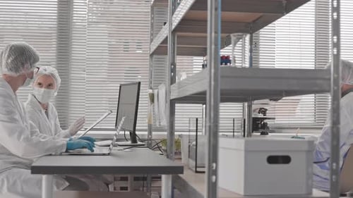 Scientists Working in a Bright Modern Laboratory