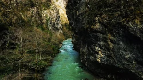 Picturesque Mountain River Flowing in a Gorge Among Picturesque Rocks