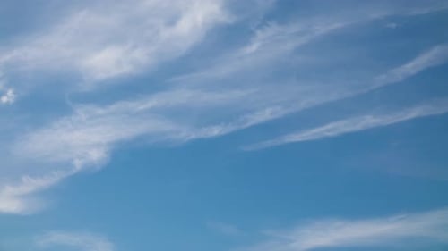 Fluffy White Clouds Moving Fast in Time-lapse. Daylight, Cloudy Heaven Background. Timelapse of
