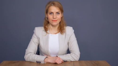 Happy Mature Businesswoman in Office