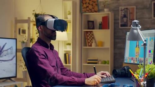 Man Using VR Headset Editing Pictures