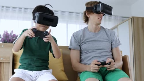 Child and Adult Playing Virtual Reality Game