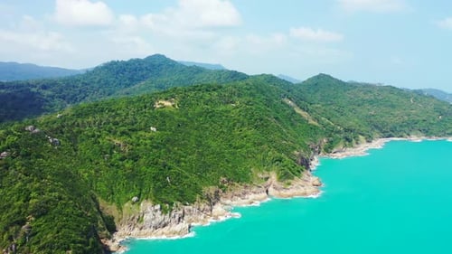 Aerial nature of exotic coastline beach vacation by blue water and white sandy background of a daytr