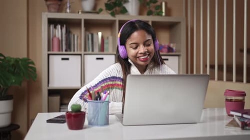 Smiling Woman on Video Call at Home