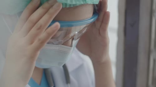 Health Care Worker Wearing Protective Gear