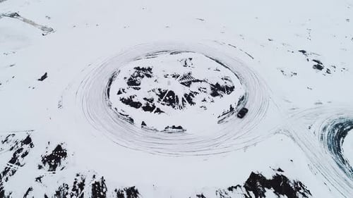Car Drifting in Snow Aerial View