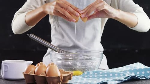 Cracking Egg Into Bowl for Cooking Recipe