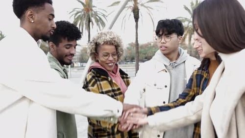 Friends Celebrate Teamwork and Unity Outdoors