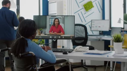 Woman in Wheelchair Attends Virtual Meeting