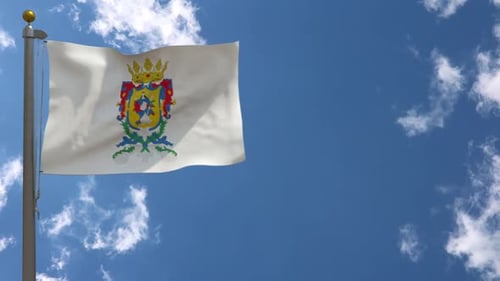 Waving White Flag with Crowned Coat of Arms in Blue Sky