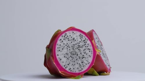 Vibrant Dragon Fruit Cut in Half Zooming In