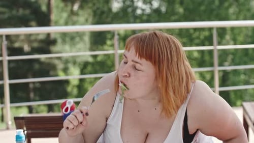 Woman Eating Salad for Health and Fitness