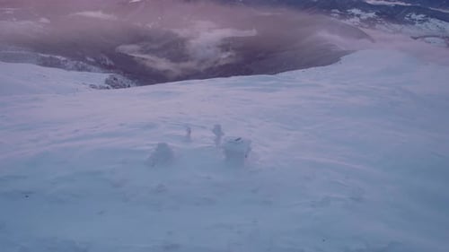 Flying Over Empty Mountain Valley at Pink Sunset