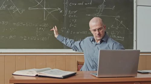 Man Giving an Online Math Lecture