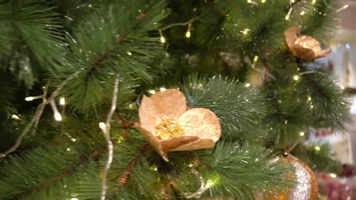 Festive Christmas Tree Decorated With Gold Ornaments