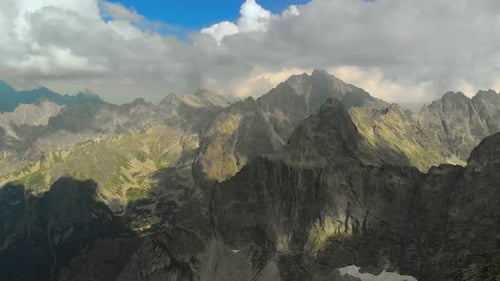 AERIAL Mountain range panorama showcasing epic landscape of mountain tops