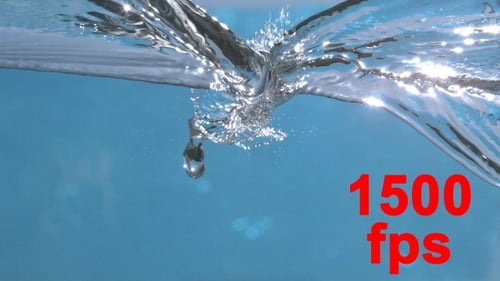 Water Splashing in Abstract Blue Light