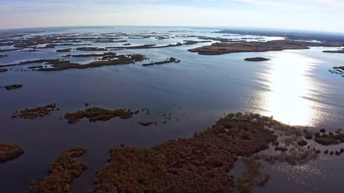 Aerial View of Island Landscape Over Water