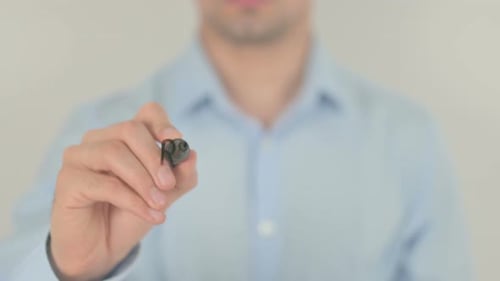 Man Writes Requirement on Glass, Business Concept