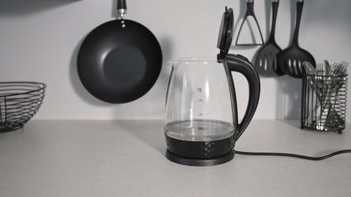 Adding Water to a Clear Electric Kettle