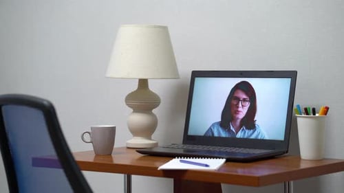Working Place with Laptop Transmitting Online Course for Distance Education