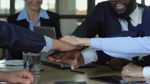 Office Workers Putting Hands Together, Cooperating for Success, Teamwork Concept