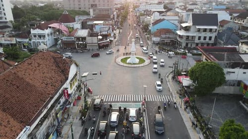 Aerial view of Tugu Yogyakarta Landmark with busy traffic.