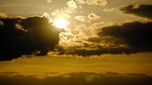 Golden Sunset with Cloudscape and Sun Rays