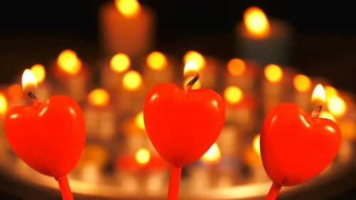 Heart Candles Glowing in Romantic Candlelight