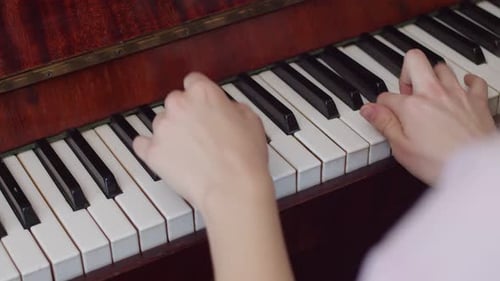 Hands Play Piano Beautifully at Home