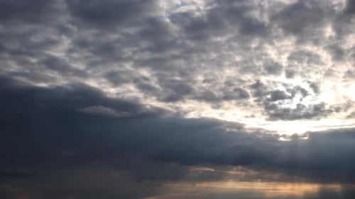 Dramatic Clouds Illuminated by the Setting Sun