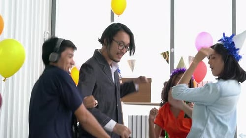 Friends Celebrating at a Cheerful Birthday Party