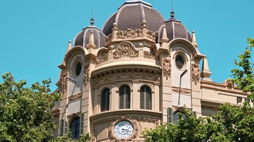 Old residential building made in classic style at sunny day in Barcelona, Spain