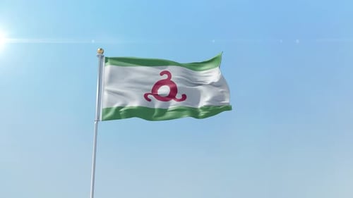 Green and White Flag with Red Symbol Waving