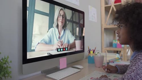 African School Kid Girl Online Learning with Remote Tutor at Home on Pc