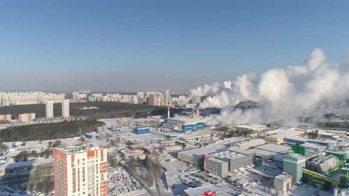 Industrial zone with a lot of smoke and steam coming out of the pipes. 04