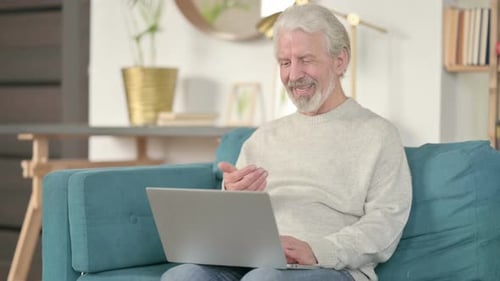 Senior Man Having a Video Call on Laptop