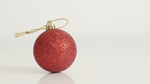 Red Christmas Ornament Decoration Sparkling on White Background