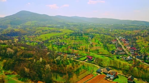 Amazing Bright Aerial View on Village in Mountains Area