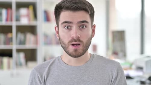 Surprised Young Adult Man Facial Expression Reaction