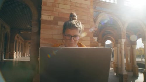 Young Student Work on Laptop at University Campus