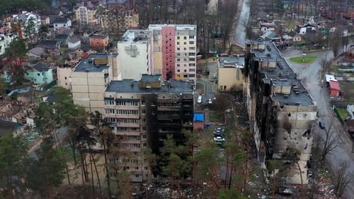 Aerial view of the destroyed and burnt houses. Houses were destroyed by rockets.