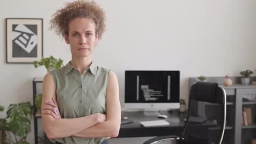 Portrait of Female Programmer at Home Office