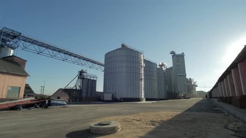 Grain Processing Facility in Rural Environment on Sunny Day