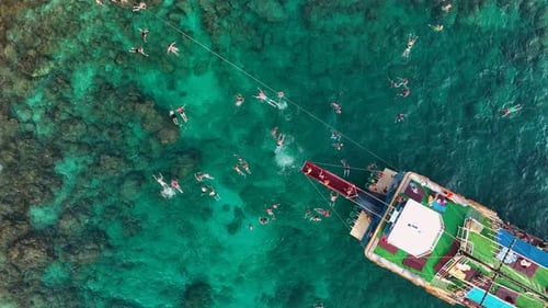 People swim in the azure sea aerial view 4 K Turkey Alanya