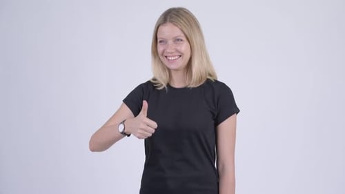 Blonde Woman Thumbs Up and Smiles