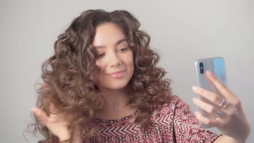 Woman Posing for Selfie with Smartphone